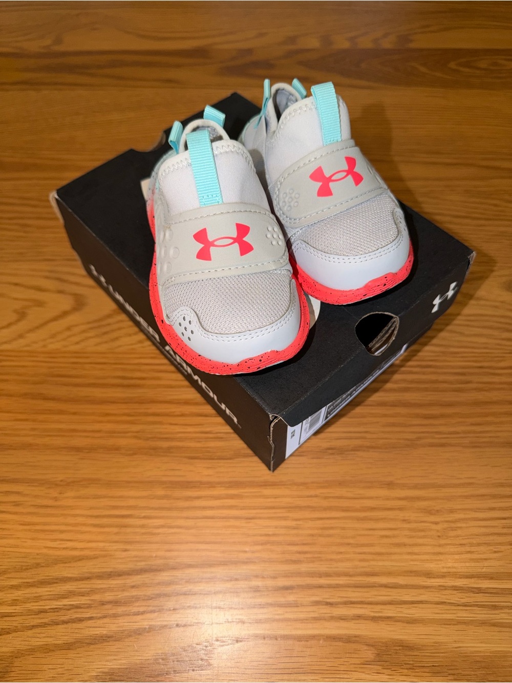 Under Armour Kids Light Gray and Coral Slip-On Sneakers with Teal Pull Tabs